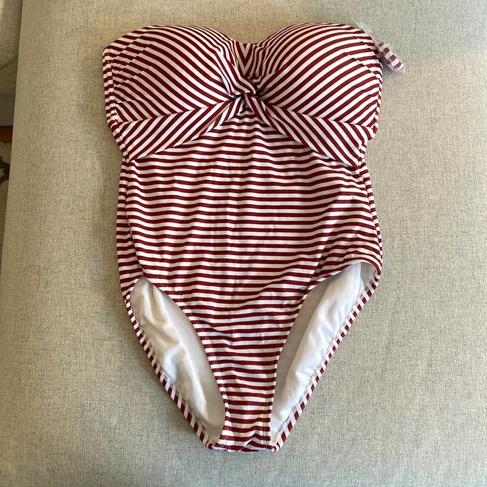 Never worn Kona Sol bathing suit. Tags off but bag with straps attached